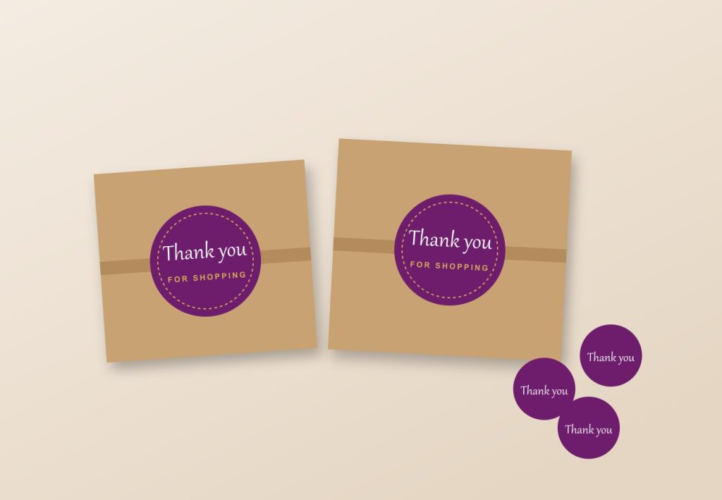 Round thank you packaging stickers on kraft boxes